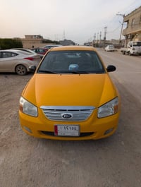 بيع + مراوس كيا سبكترا  لون اصفر اجره موديل 2009 محرك 2000  وارد امريك...