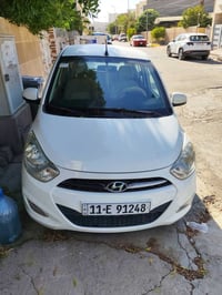 هونداي i10 للبيع بيضاء موديل ٢٠١٤ نظيفه كير محرك تبريد صدر مكفولات بيه...