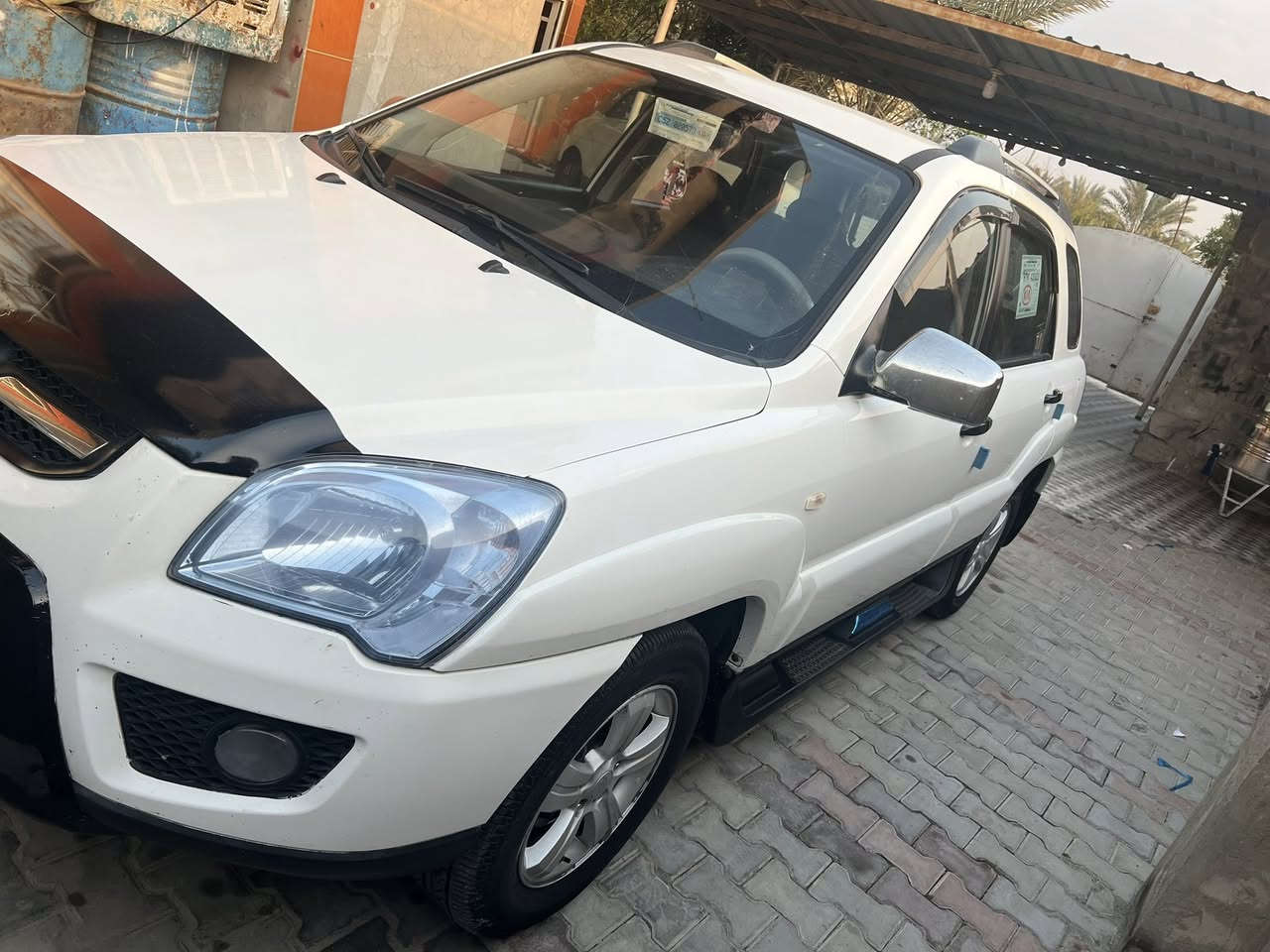 سبورتج موديل 2009 محرك لوك 2000 بيها صبغ بنيد كشنات جلد حساسات تبريد ثلج صدر جديد تخم تاير جديد سعرها ١١٣ بيها مجال *********** مكان ديالى
