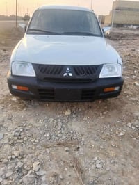 ميتسوبيشي • موديل 2002 • مكينة وكير جديد