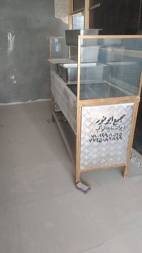 گلمن • خزانة • عنوان