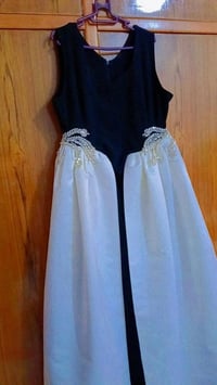 فستان • لبسته ٢ ساعة • صورة ضلمة