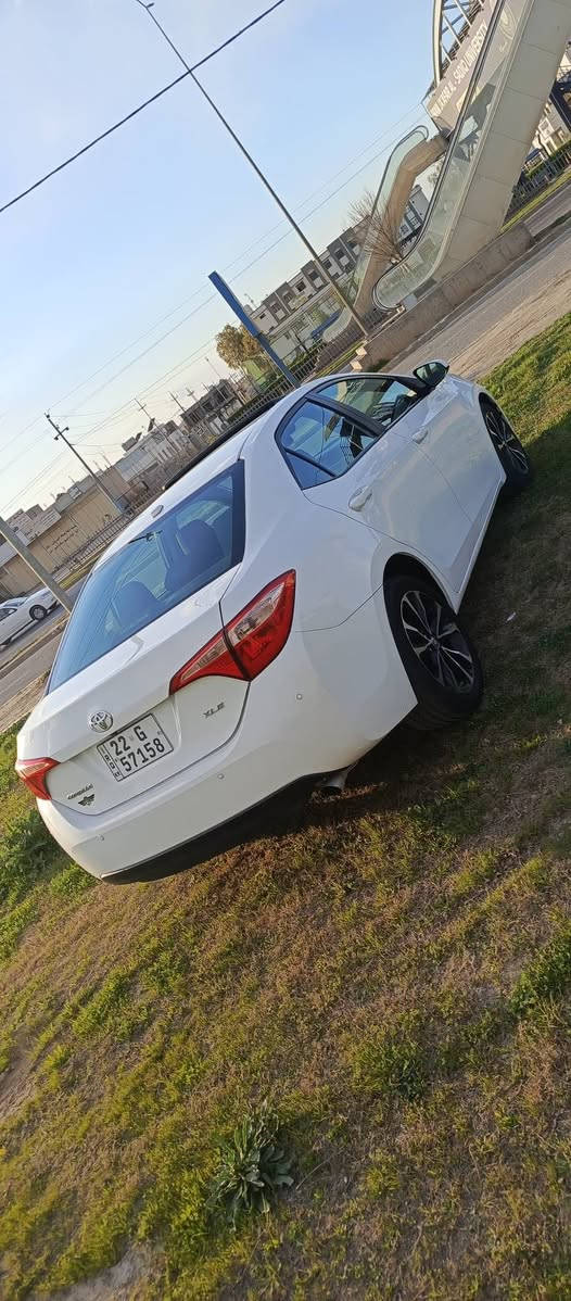 سلام عليكم سياره للبيع تويوتا كورولا موديل 2018 سياره فول مواصفات سياره فقط بها بابف باب خلف السائق رش سياره بدون دواخل سياره كلش حلوه سنويه رقم جديد باسم شرط التحويل عنوان كركوك اتصال ***********
