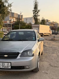 اوبترا 2006 رقم بغداد شرط التحويل  السيارة بيها 3قطع صبغ وبيها تقحيل ب...