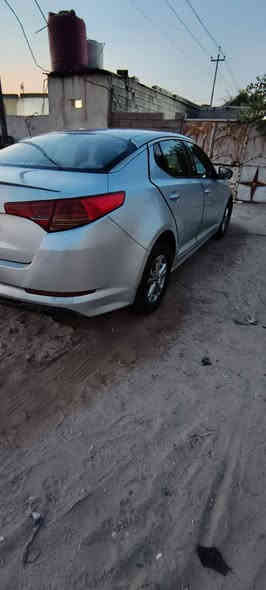 سلام عليكم اوبتما موديل2011 وارد كوري والكوري ما ينكفل من صبغ محرك 2000دوش بيه خيط تبخير  سعره 95 عنوان بصره خور الزبير رقم ***********
