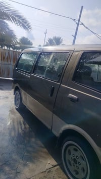 بيرجو موديل 2001رقم بغداد باسمي كير ومحرك وشواصي مكفول مصفره هئية ومرو...