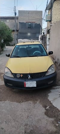 لانسر 2010 مكينه 2000 بيه تبخير  تبريد شغال لاضربه ولاتبديل سنويه 2029...