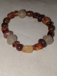 سوار • حجر كهرماني • طبيعي