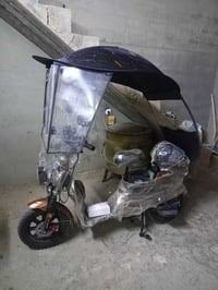 دراجة كهربائية • سكوتر كهربائي