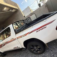 هايلوكس 2025شركة ساز ضمان رقم اربيل زيرو ماشية 1600كليو فول موصفات الس...