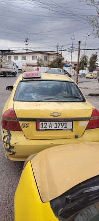 افيو تكسي كوري 2009للبيع رقم نينوى شرط التحويل هيئه وغرمه صغر كير ومحر...