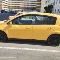 عندي نيسان فيرسا تكسي موديل ٢٠٠٨رقم كربلاء بااسمي محرك جديد السياره جا...