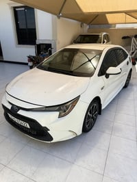 كورلا موديل ٢٠٢٠اصل وارد امريكي كلين مكفوله من الضربه والصبغ هايبرد ما...