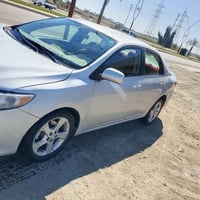 كورولا • موديل ٢٠٠٩ • نظيفه