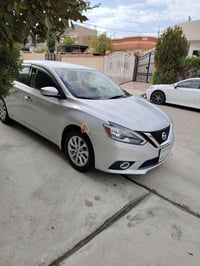 نیسان سێنترا 2019 SV کلین پێش و پشتی کەپسە  تەنھا دەعامی بێشەوە بویاغە...