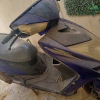 سكنز صيني الدراجه متروكه شغاله  مجفته كهربائياته شغاله سلف يشتغل بس يك...