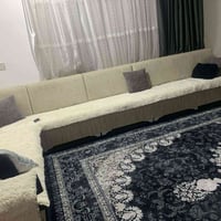 كنبة يدوية • نزیک بازیان • مفاوضة