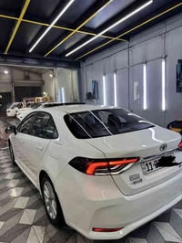 كورلا هايبرد للبيع 2024 ماشيه 28 الف رقم بغداد السياره مكفوله بدون صبغ...