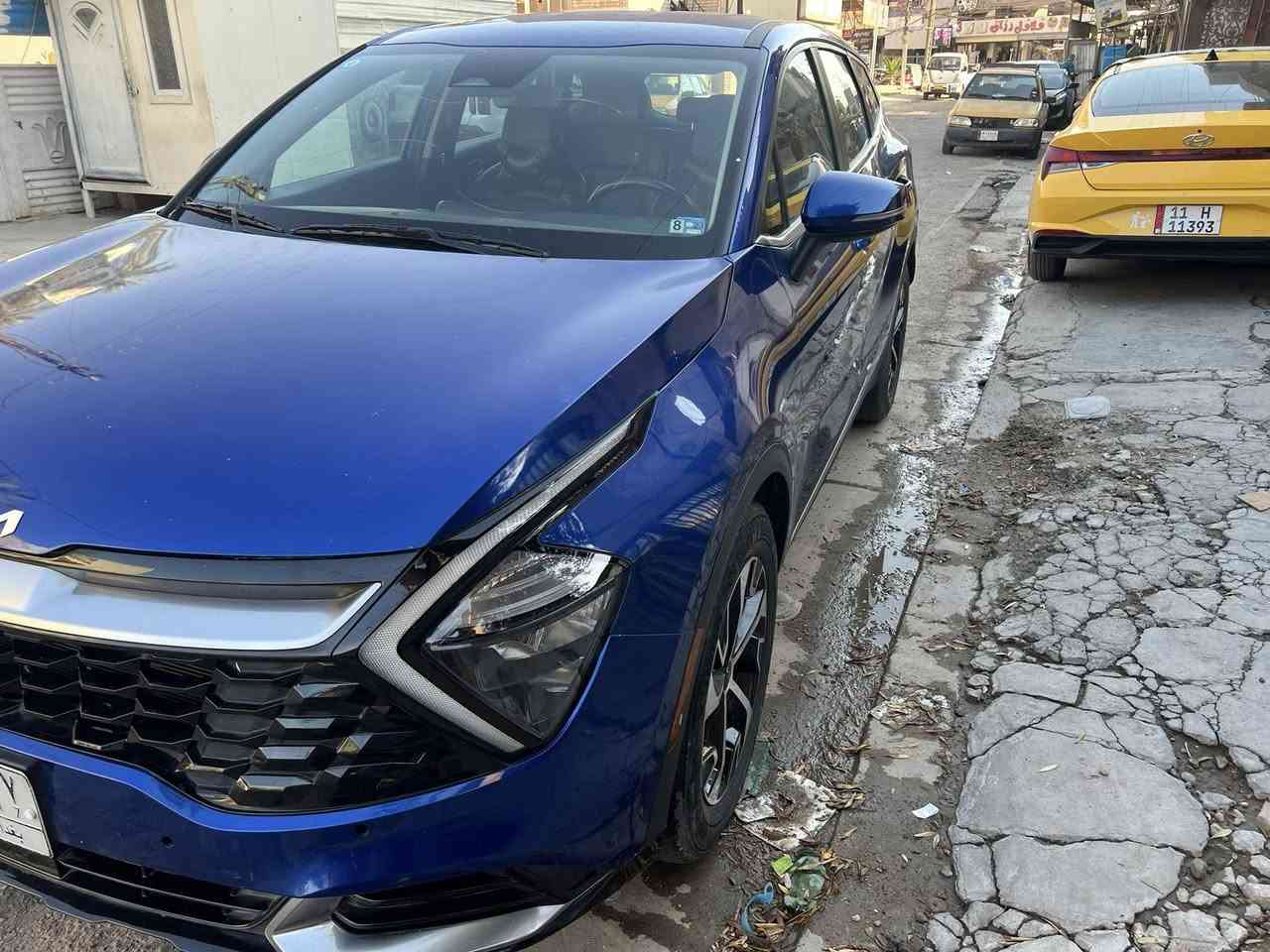 KIA Sportage EX 2023 
سبورتج  الطويل  فول عدا  البانوراما  
‎لون ازرق (بحري) 
ماشية 43الف 
مرقم بغداد باسمي رقم الجديد
السيارة بيها البنيد تبديل بدون ايرباك بقية السيارة مكفولة من كلشي 
المواصفات/
‎🔵 محرك 2500 
‎🔵 كير 8 نمر 
‎🔵 بصمة تشغيل - ابواب - صندوك - تشغيل عن بعد
‎🔵 شاشة كبيرة على طول  الدشبول تدعم car play
‎🔵 كيجات الكترونية متغيرة حسب الوضعيات
‎🔵 انظمة القيادة : سبورت - سمارت - نورمال
‎🔵 كشنات جلد لون اسود 
‎🔵 كرسي كهرباء 
‎🔵 اضواء ترحيب عند الاقتراب مع ترحيب داخلي 
‎🔵 شحن وايرليس
‎🔵 منافذ تايب سي عدد 3 مع 2 في الكشنات ومنفذ يو اس بي 
‎🔵 هاند بريك بصمة
‎🔵 اوتو هولد
‎🔵 نقطة عمياء 
‎🔵 رادار امامي،جانبي،خلفي +حساسات خلفية
‎🔵 تحديد مسار ذكي
‎🔵 قيادة ألية ذكية
‎🔵 كروز سرعة
‎🔵 كشنات تدفئة 
‎🔵 شاشة لمس متغيرة لتحكم الميديا او لتبريد
‎🔵 فول تحكم ستيرن
‎🔵 تبريد قطعتين
السعر 185 ورقة ومجالها بسيط 
للاستفسار /***********

