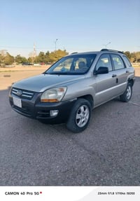 سبورتج 2008 امريكي. سياره عندي  بيها صفحه صبغ ولبنيد وقمار اثر جراد صب...