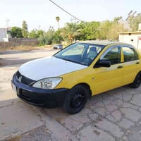 لانسر ٢٠١٠ • تايرات جديدة • حادث خلفي