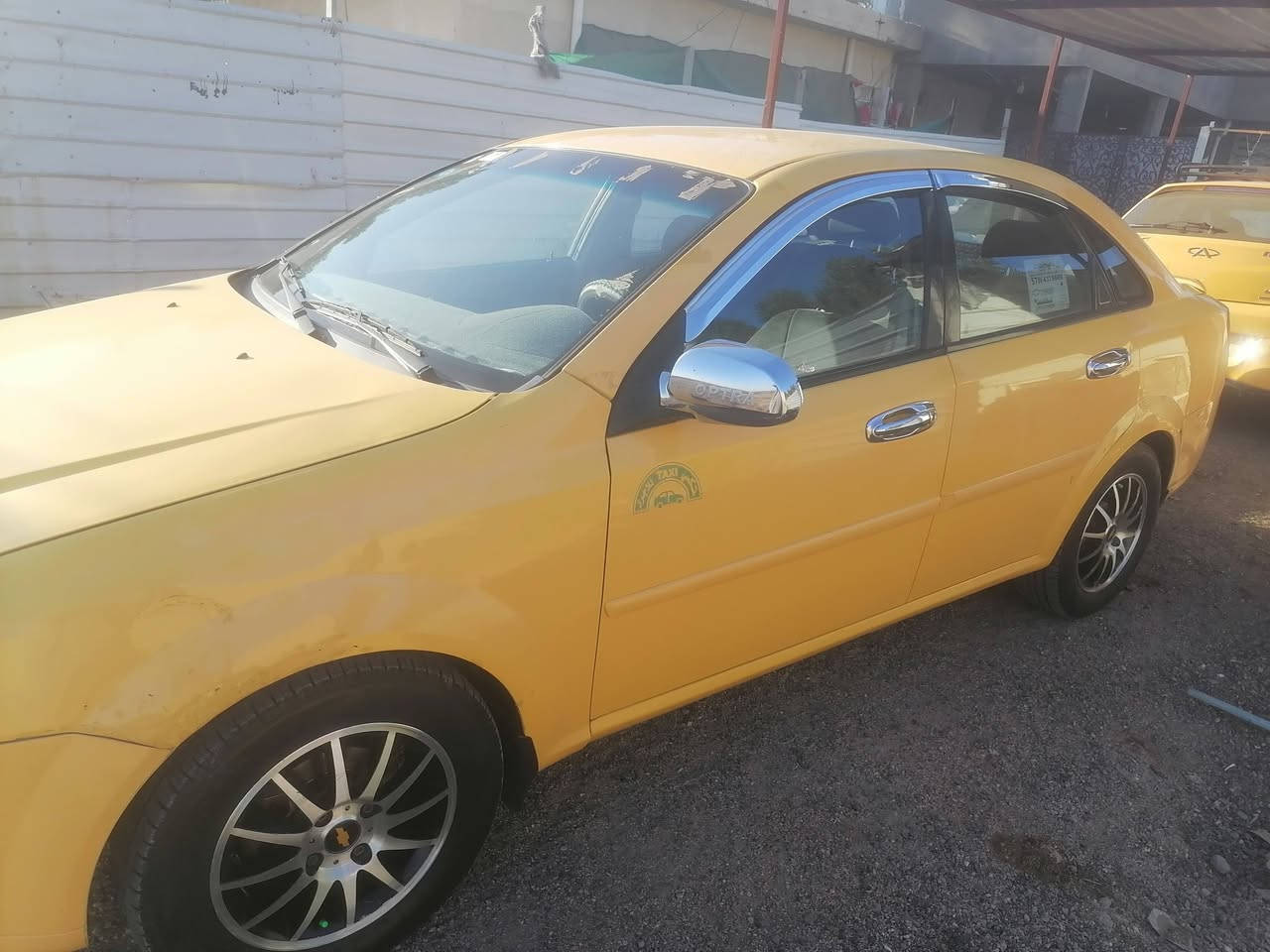 سلام عليكم اخوان اوبترا 2011 شركة العامة السيارة بيه فقط جراد بل صبغ السيارة بيه فقط بارد بل جاملغ صفحة السايق الباقي كفالة كير محرك صدر تايرات جديد التبريد فقط الصوندة طاكة تتبدل وتشحن غاز ويشتغل غرفة جديد دوشمة جديدة  السعر ٦٨بيه مجال قليل الاتصال على ***********
