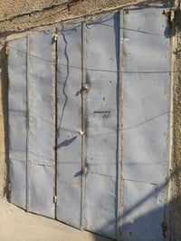 باب محل حديد 5 طلاقات لسعر 100 مكاني الشعله 07710982955