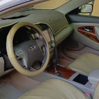 كامري موديل 2008 صبغ بنيد وجاملغ ايمن ونص من الباب حادث امريكا سطحي بد...