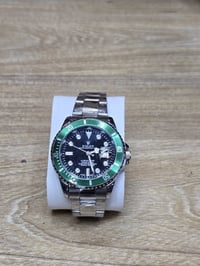 رولكس سابمارينر • إطار أخضر • ستانلس ستيل