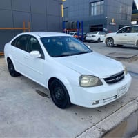 اوپترا ٢٠٠٩ • اوتوماتيك • شبابيك كهربائية