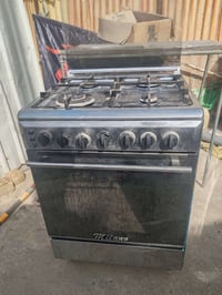 طباخ ٤ عيون مع فرن  حته النايلون الازرك بعده بي نارة بريمز مكاني البنو...