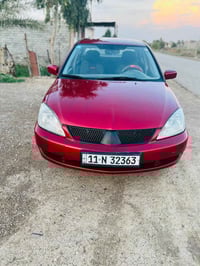 لانسر ٢٠٠٩ • مكينة وكير مكفولات • رقم بغداد دولي