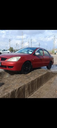 لانسر ٢٠١٠ • ١٥٠٠ • رقم بغداد