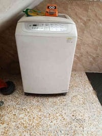 غسالة اوتماتيك نظيفه باب اول قليل استعمال مع تنور غاز الاستفسار 078113...