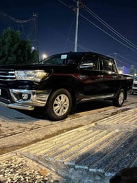 تويتا هايلوكس 2023ساز مغلفه(ppfبالكامل) رقم بغداد الدولي مميز تحويل مب...