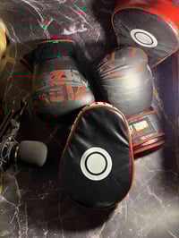 كفوف ملاكمة • مصدات