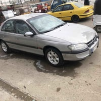 اوبل بزون موديل 1995كيرومكنه ونجي ٤سندرتبريد شغل ماعده راتيتر فقط تخم ...