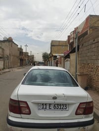 نيسان سني ياباني 2002 رقم بغداد گير عادي بكان بغداد الحسينيه السعر 55 ...