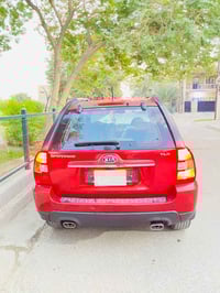 سبورتج 2010 مواصفات TLX يعني فول السياره وارد كوري كفاله عامه  لون مار...