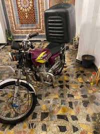 دراجه ايراني اربعة كير للبيع السعر 400 وبيها مجال  07704899961