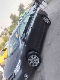 كورلا 2012 خليجي رقم اربيل باسمي سنويه ل 30  ماشيه 172 الف حقيقي. بي ج...