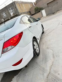 اكسنت • ٢٠١٤ • رقم بغداد