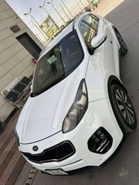 للبيع كيا سبورتج خليجي (ضمان الدوليه ) رقم بغداد انكليزي ب اسمي  موديل...