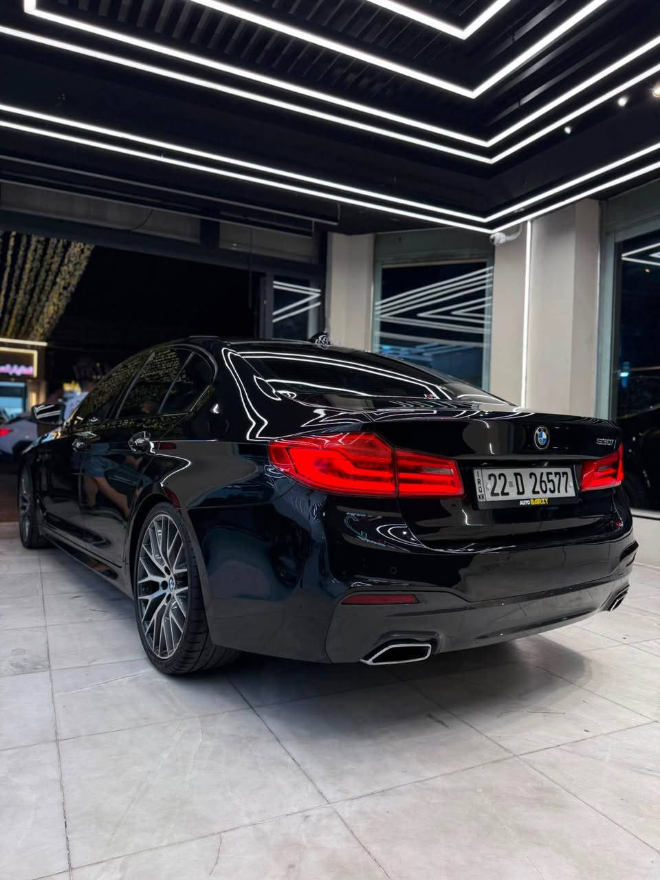 BMW 530i 2018 INDIVIDUAL M PACKAGE
كفالة عامة وارد خليجي
BLACK اللون: اسود
الممشى: 86 km
فول مواصفات ١/١++
Special Order Black Edition
بصمة 
فتحة سقف (سلايد)
كراسي جلد أصلي مشمشي
كراسي كهرباء (أمامي) فئة Series 7
SMART MEMORY كراسي
SPORT كراسي رياضية
مقود كهربائي 
نظام التحدث مع المركبة 
شاشة أمامية كبيرة TOUCH
ماوس تحكم
شاشات خلفية أصلية مع ريمونت
4 كامرات ذكية
كامرات 360
Head Up Display
هاندبريك كهربائي
AUTO HOLD
وضعيات قيادة متعددة
(Eco / Comfort / Sport)
ناقل حركة أوتوماتيك + عادي •
كير 8 سرعات
AUTO START
مانع انزلاق
نظام تحديد المسار
كروز كنترول
نظام تحديد السرعة القصوى

SMART ADAPTIVE زنون 
أوتو عالي
بك لايت 3D
بك لايت ضبابي
M POWER 20 ويل قياس
M POWER فجوج بريك

فتح صندوق كهربائي (حساس القدم) 
حساسات أمامي + خلفي 
حساس مطر
BLIND SPOT!
WIRELESS CARPLAY E
Bluetooth / USB / iPod / CD
السعر 29500$ يعني 295 ورقه

للاستفسار *********** بغداد, العراق
