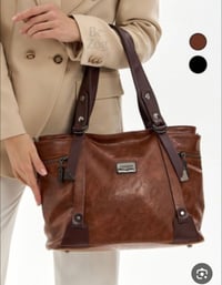 جنطة نسائية • جلد طبيعي • قيمة