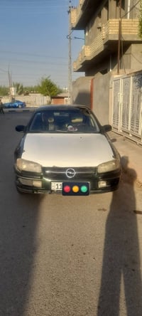 اوميكا بزون موديل ١٩٩٦ محرك ٢٠٠٠ كير عادي  رقم بغداد انكليزي السنويه ل...