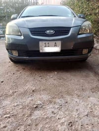 كيا ريو موديل 2006 وراد كندي رقم بغداد انكليزي بسمي هزة جديدة سنوية 20...