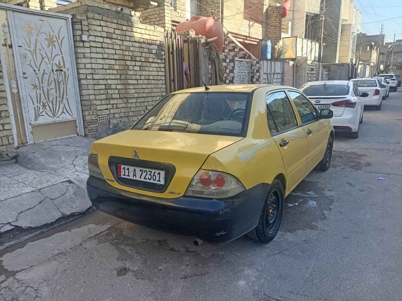 سيارة مسوبيشي لانسر سيارة بلاديه من طول لطول سعر 73 مكاني بالبلديات مقابيل نادي الصناعة هاذة رقم ***********
