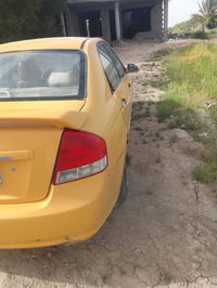 2009 جديده سياره بسمي تحويل مباشر سعر56 بيه مجال سبكترا  07732352532