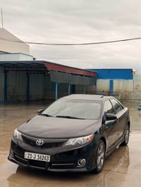 كامري SE • ٢٠١٢ • جلد وشاشة